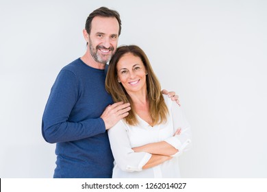 Beautiful Middle Age Couple In Love Over Isolated Background Happy Face Smiling With Crossed Arms Looking At The Camera. Positive Person.