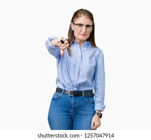Beautiful middle age mature business woman wearing glasses over isolated background looking unhappy and angry showing rejection and negative with thumbs down gesture. Bad expression.