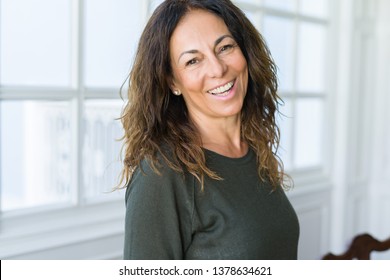 Beautiful middle age woman at home smiling cheerful - Shutterstock ID 1378634621