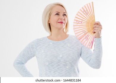 Beautiful Middle Aged Woman With Menopause Blowing By Fan. Hormone Replacement Therapy And Mature Woman Healthcare. Mid Age Happy Women Lifestyle. Senior Woman Isolated On White Background