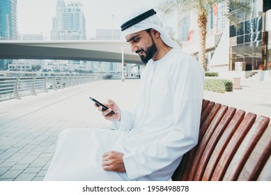 Beautiful middle eastern man wearing kandora traditional outfit in Dubai. Portraits in the emirates - Powered by Shutterstock