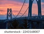 Beautiful Mid-Hudson bridge in New York during sunrise with American Flag