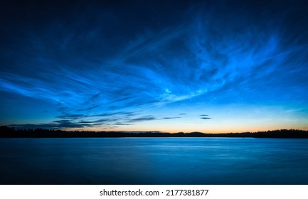 Beautiful midnight sky over the lake - Shutterstock ID 2177381877