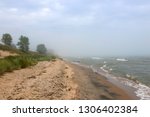 Beautiful midwest nature background. Summer landscape with mist over the lake Michigan and beach at Kohler-Andrae State Park, Sheboygan area, Wisconsin, USA.