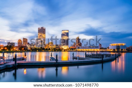 beautiful milwaukee  at night with reflection in water ,wisconsin,usa.