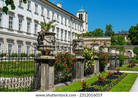 Beautiful Mirabell palace in Salzburg Austria with rose garden and statues ,