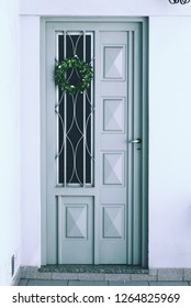 Beautiful Mistletoe Hanging On Light Blue Door