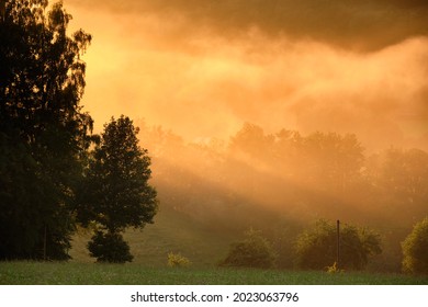 Beautiful Misty Summer Landscape In The Countryside During Sunset. Seen In Germany In The Rhön Mountains In Summer