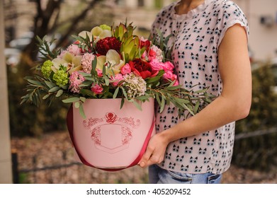 Beautiful  Mix Flower Bouquet In Round Box With Lid Hold By Woman 