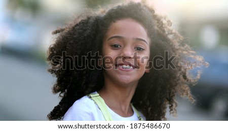 Pretty girl with long afro hair