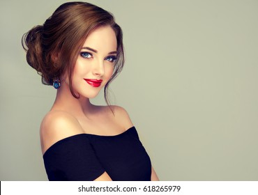 Beautiful model girl  with elegant hairstyle . Woman with fashion style makeup