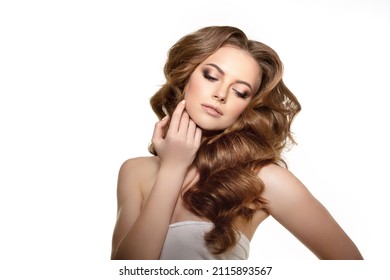 Beautiful Model Girl With Long Wavy And Shiny Hair . Beauty Woman Model With Curly Updo Hairstyle . Fashion, Cosmetics And Makeup