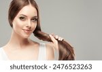 Beautiful model girl with shiny brown and straight long  hair . Keratin  straightening . Treatment, care and spa procedures. Smooth hairstyle

