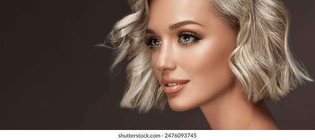 Beautiful model girl with short hair .Beauty woman with blonde curly hairstyle dye .Fashion, cosmetics and makeup - Powered by Shutterstock