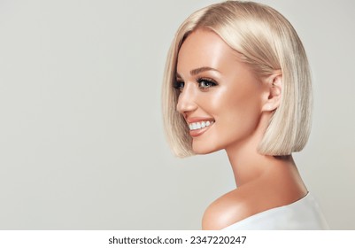 Beautiful model girl with short straight hair .Beauty woman with blonde Bob   hairstyle  .Fashion, cosmetics and makeup - Shutterstock ID 2347220247
