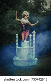 Beautiful Model Is Posing With Giant Cake