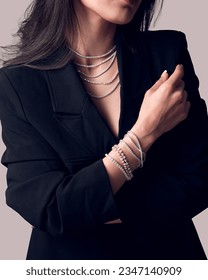 beautiful model wearing elegant tennis bracelet and necklace. 