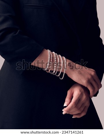 beautiful model wearing elegant tennis bracelet. 