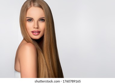 Beautiful model woman with shiny  and straight long hair. Keratin  straightening. Treatment, care and spa procedures. Blonde beauty  girl smooth hairstyle - Shutterstock ID 1760789165