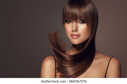 Beautiful Model Woman With Shiny And Straight Long Hair. Keratin Straightening. Treatment, Care And Spa Procedures. Beauty Girl Smooth Hairstyle