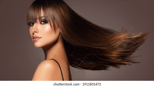 Beautiful model woman with shiny  and straight long hair. Keratin  straightening. Treatment, care and spa procedures. Beauty  girl smooth hairstyle - Shutterstock ID 1911831472