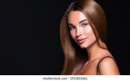 Beautiful model woman with shiny  and straight long hair. Keratin  straightening. Treatment, care and spa procedures. Beauty  girl smooth hairstyle