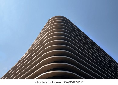 Beautiful modern architecture of the building against the background of the blue sky