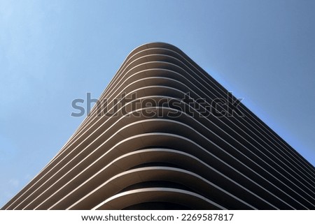 Beautiful modern architecture of the building against the background of the blue sky
