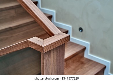 Beautiful modern glass railing for wooden staircase with wooden handrail - Powered by Shutterstock