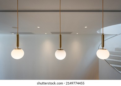 Beautiful modern group set of three ceiling lamps light bulbs ball shape decoration for home and living on the wall background with copy space for text. Concept building interior contemporary. - Powered by Shutterstock