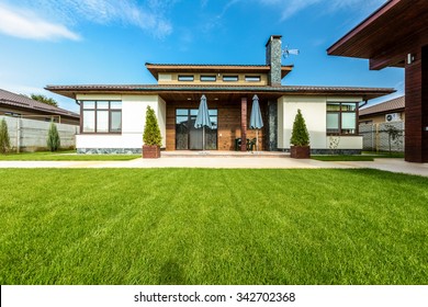 Beautiful Modern House In Cement, View From The Garden.