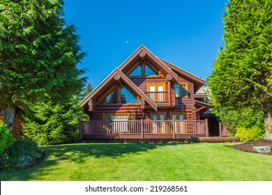 Beautiful modern log house in the mountains in Canada - Powered by Shutterstock