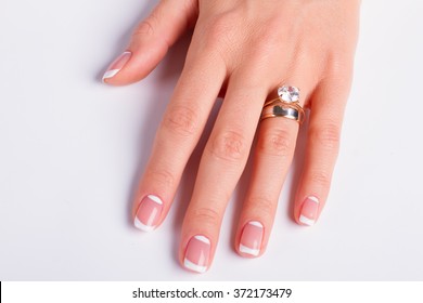 Beautiful Moon French Manicure. Diamond Ring And Wedding Ring On Woman's Finger. 