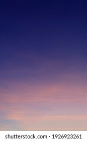 Beautiful Morning Clear Sky Background. Colorful Yellow Blue Sky. Morning Colorful Clear Blue Sky Background With Soft White Clouds Sunrise Or Sunset.