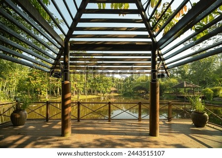 Beautiful morning landscape view from the gazebo of the flamingo pond in Putrajaya Wetlands Park.