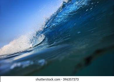 Beautiful Morning Shorebreak Surfing Wave. Rip Curl In Bright Blue Ocean. Clear Blue Sky Seascape With Nobody On Image.