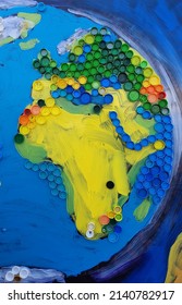 Beautiful Mosaic Of Africa And Europe Continents From Colourful Plastic Bottle Caps. Recycling Art Projects. Zerowaster, Eco-friendly. Reuse, Reduce, Recycle. 