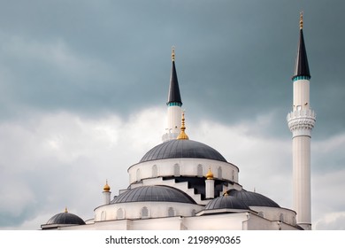 a beautiful mosque in a dark cloudy weather