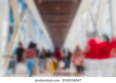 Beautiful motion blur of people walking in the mall, busy modern life concept. Suitable for web and magazine layouts. - Powered by Shutterstock