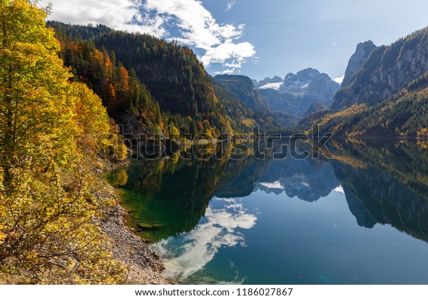 Beautiful mountain lake in Austrian Alps. Autumn background