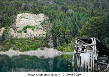 Beautiful Mountain Lake and Ruined Building, Pine Trees in the Background - San Carlos de Bariloche, Argentina 