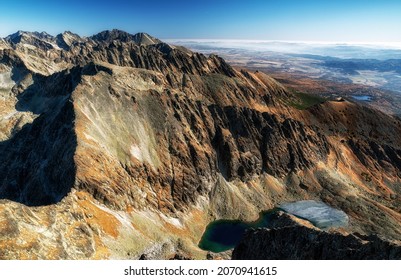 Beautiful mountain landscape. Peaks Furkotsky stit and Hruby vrch in High Tatras mountains at Slovakia. Krivanske zelene pleso at background. - Shutterstock ID 2070941615