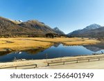 Beautiful mountain panorama at Upper Engadin Valley with Inn River in the Swiss Alps on a sunny autumn day. Photo taken November 15th, 2024, Samedan, Switzerland.