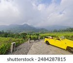 Beautiful mountain scenaries in Borobudur area with a yellow VW.