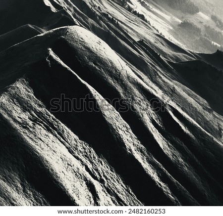 Similar – dunkler Bergkamm Berge