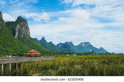 Beautiful mountains with the blue sky and wooden bridge, place to travel Khao Sam Roi Yot, Prachuap Khiri Khan, Thailand.
