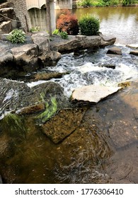 Beautiful Moving Water Over Rocks In Flint Michigan.