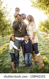 Beautiful Multi Ethnic Family Portrait Outdoors