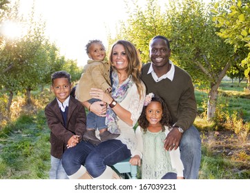 Beautiful Multi Ethnic Family Portrait Outdoors