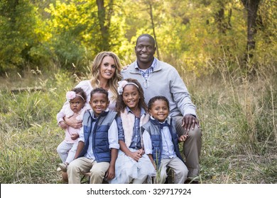 Beautiful Multi Ethnic Family Portrait Outdoors